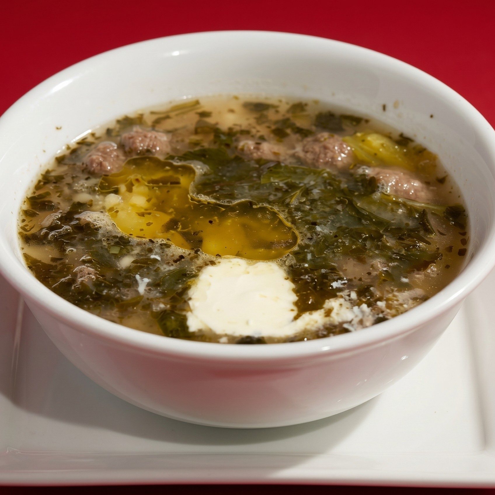 Wedding Soup with Meatballs, Ricotta and Romano Cheese.